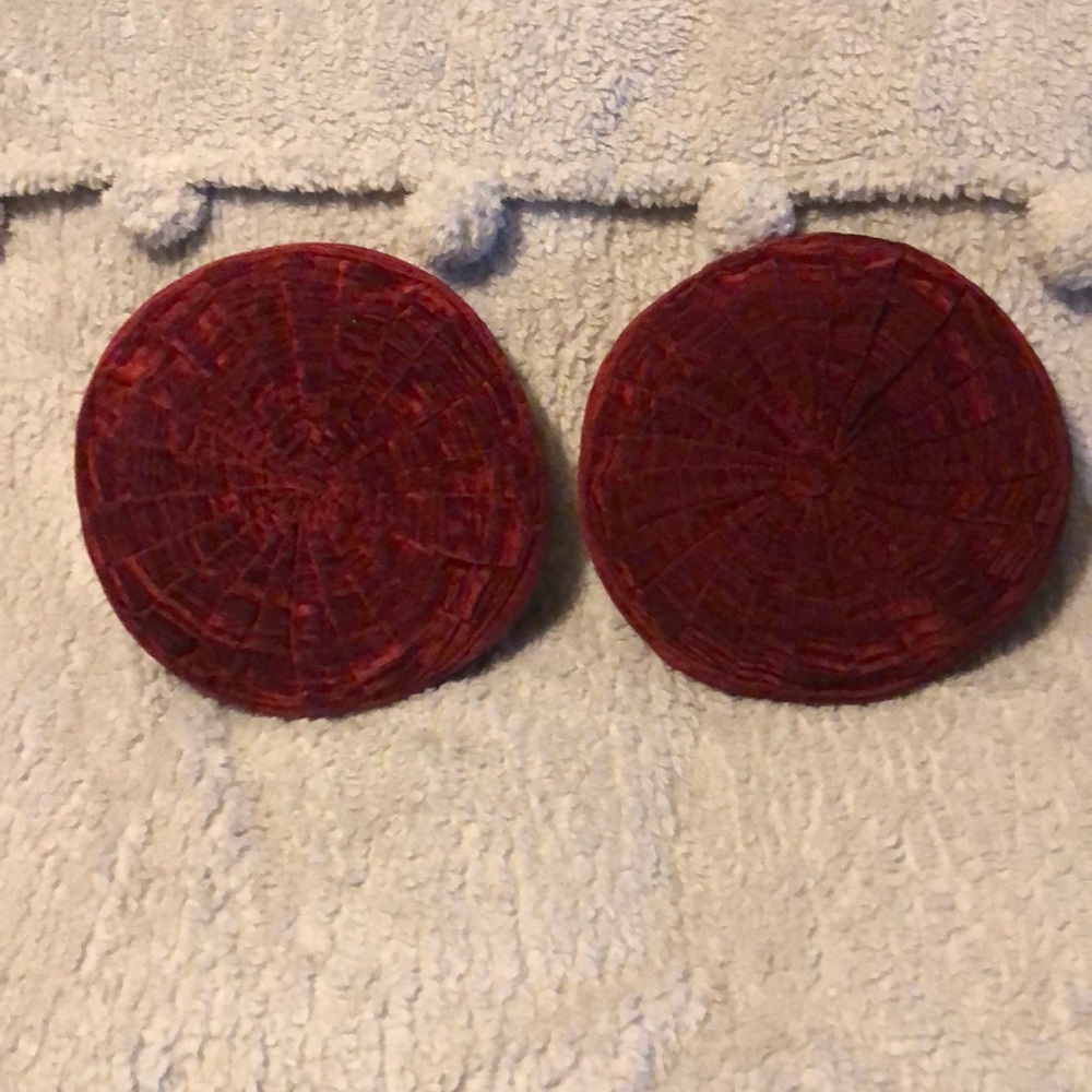 Two Round Ruby Red Borgata Pillows.